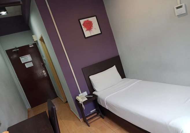 Imagen de la habitación del Hotel Sayang. Foto 9