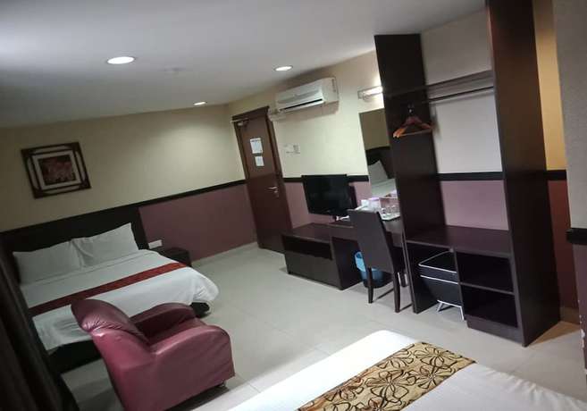 Imagen de la habitación del Hotel Sayang. Foto 11