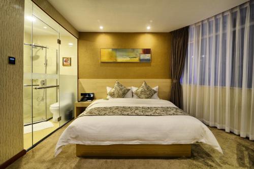 Imagen de la habitación del Hotel Sb Junying. Foto 6
