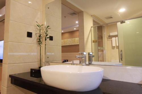 Imagen de la habitación del Hotel Sb Junying. Foto 8