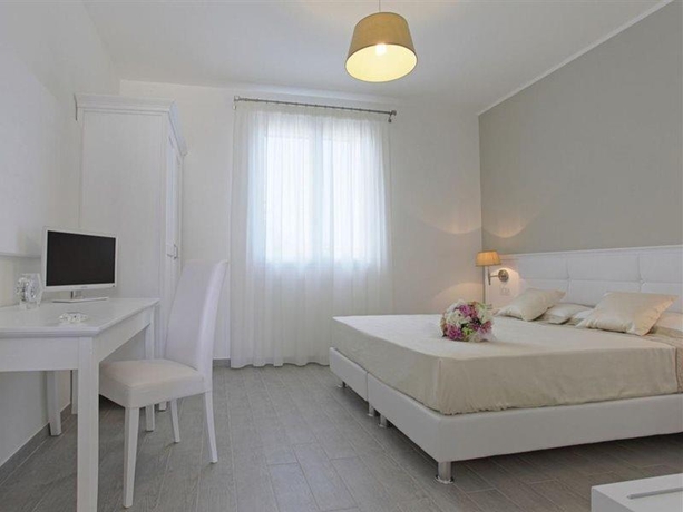 Imagen de la habitación del Hotel Scala Dei Turchi Resort. Foto 10