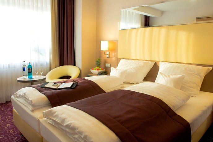 Imagen de la habitación del Hotel Scala Frankfurt City. Foto 11