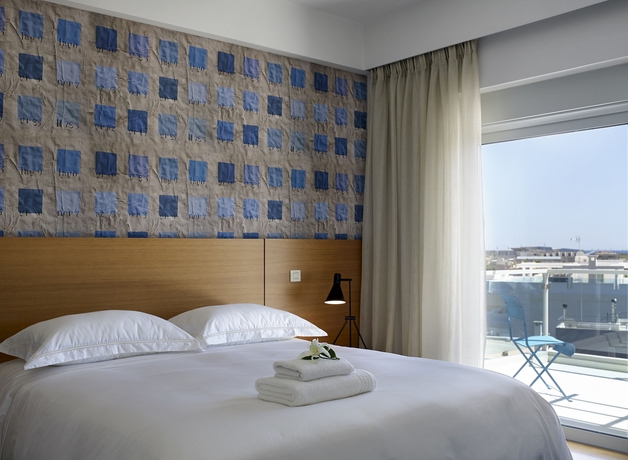 Imagen de la habitación del Hotel Scale Suites. Foto 5