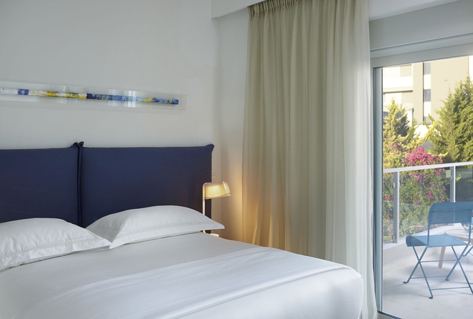 Imagen de la habitación del Hotel Scale Suites. Foto 8