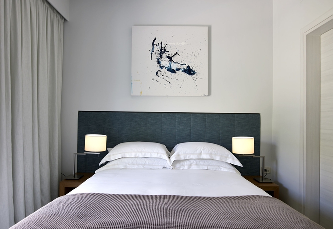 Imagen de la habitación del Hotel Scale Suites. Foto 9