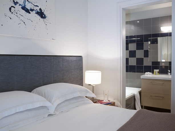 Imagen de la habitación del Hotel Scale Suites. Foto 10