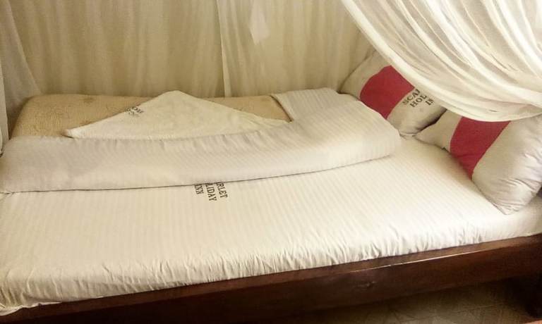 Imagen de la habitación del Hotel Scarlet Holiday Inn. Foto 5