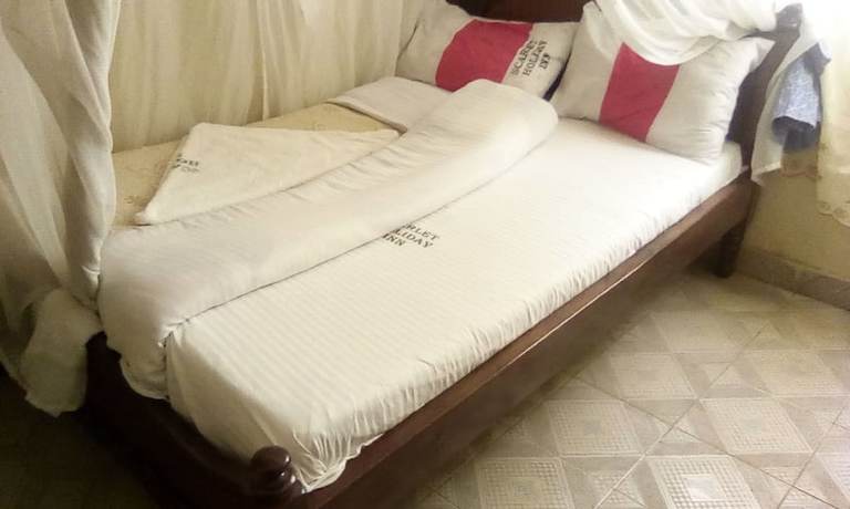 Imagen de la habitación del Hotel Scarlet Holiday Inn. Foto 7