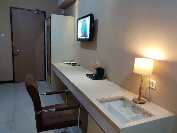 Imagen de la habitación del Hotel Scarlet Kebon Kawung. Foto 6