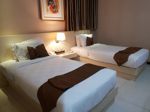 Imagen de la habitación del Hotel Scarlet Kebon Kawung. Foto 9