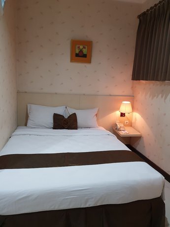 Imagen de la habitación del Hotel Scarlet Kebon Kawung. Foto 14
