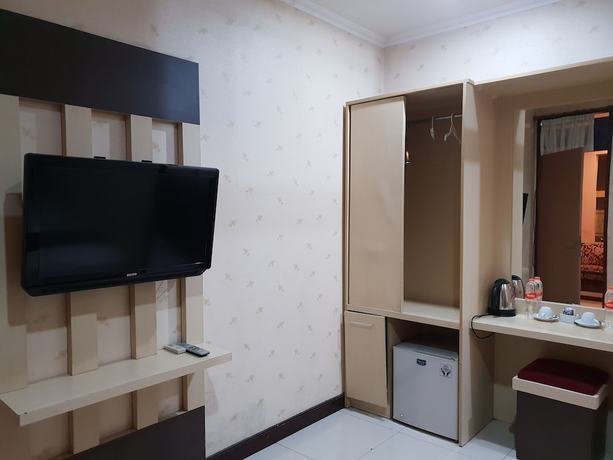Imagen de la habitación del Hotel Scarlet Kebon Kawung. Foto 17