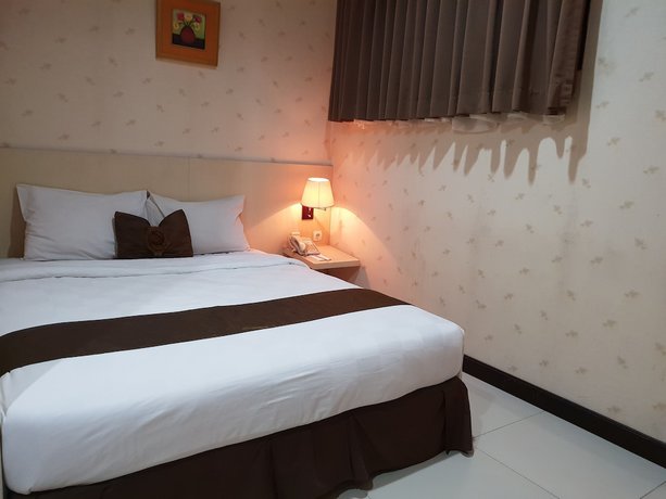 Imagen de la habitación del Hotel Scarlet Kebon Kawung. Foto 18