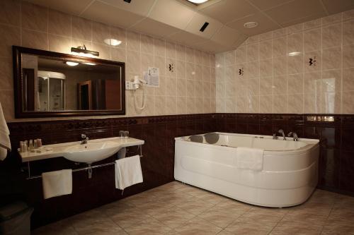Imagen de la habitación del Hotel &Scaron;iauliu Krasto Medžiotojų Užeiga. Foto 9