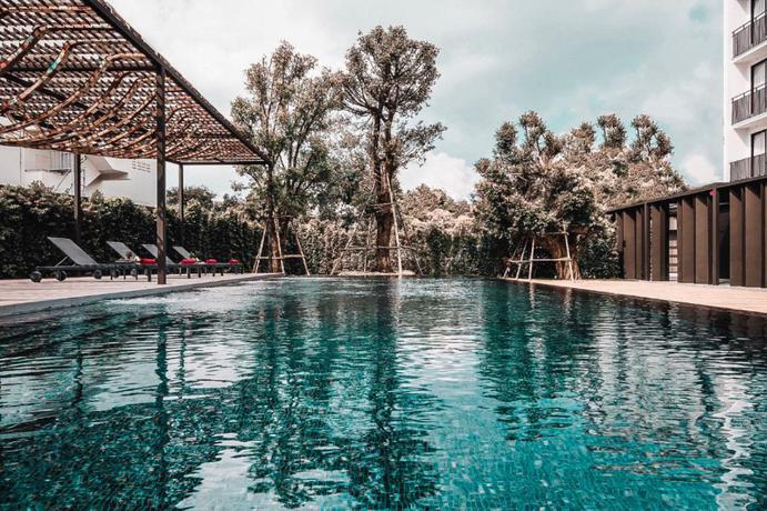 Imagen de la piscina del Hotel Scene Bangkok Noi. Foto 19