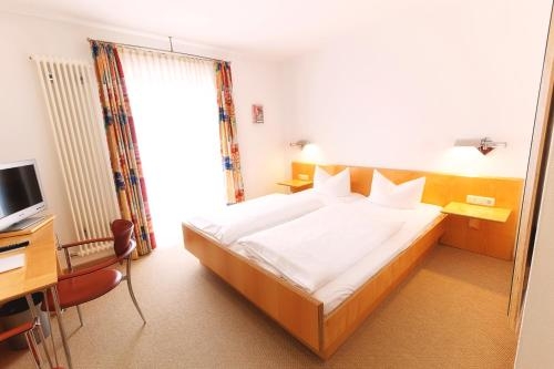 Imagen de la habitación del Hotel Schattenhofer Brauereigasthof. Foto 9