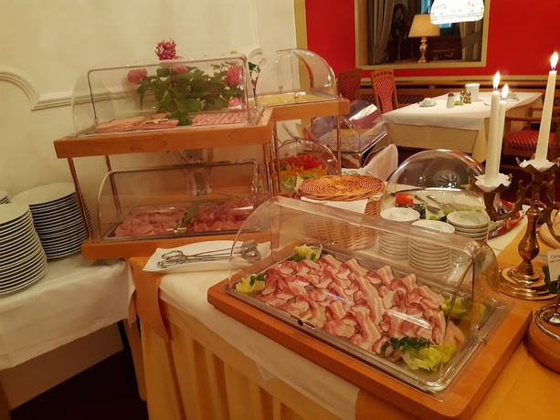Imagen del bar/restaurante del Hotel Schedlers L&ouml;wenhotel Garni. Foto 9