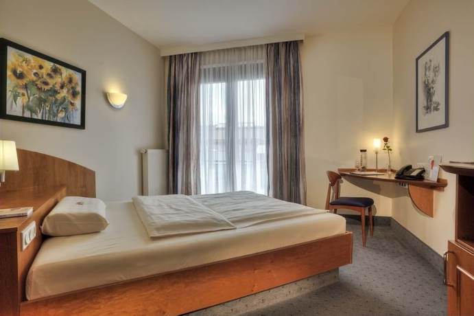 Imagen de la habitación del Hotel Schiller, Olching. Foto 8