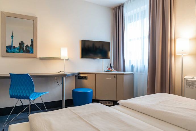 Imagen de la habitación del Hotel Schiller, Olching. Foto 11