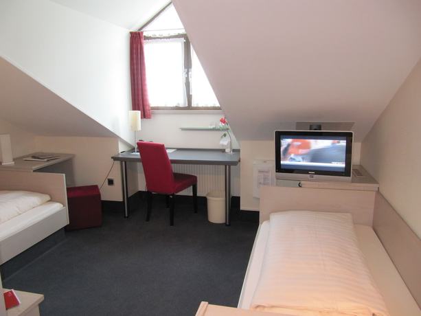Imagen de la habitación del Hotel Schiller, Olching. Foto 13