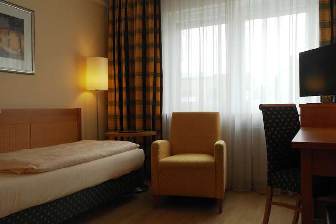 Imagen de la habitación del Hotel Schiller, Olching. Foto 17