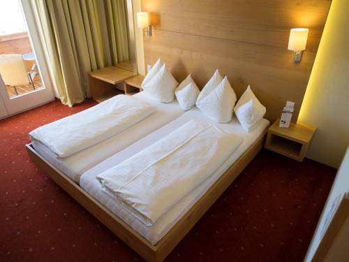Imagen de la habitación del Hotel Schillerkopf Alpinresort. Foto 5