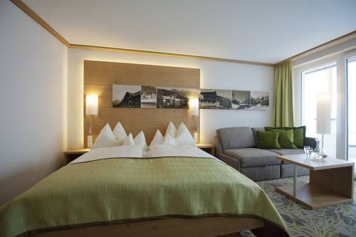 Imagen de la habitación del Hotel Schillerkopf Alpinresort. Foto 7
