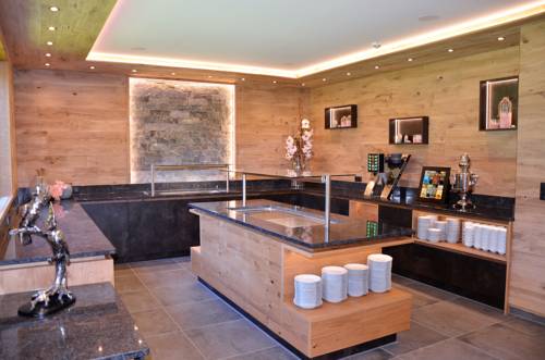 Imagen de la habitación del Hotel Schladmingerhof. Foto 8