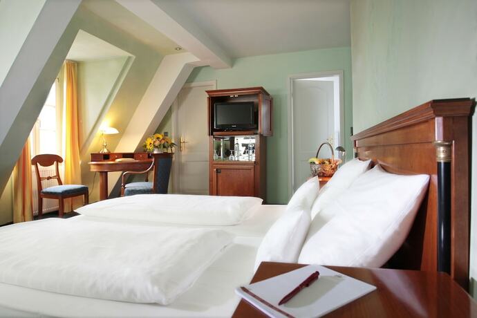 Imagen de la habitación del Hotel Schloss Edesheim. Foto 16