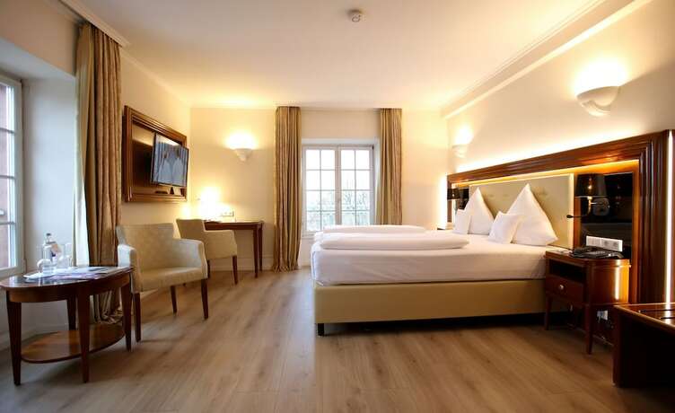 Imagen de la habitación del Hotel Schloss Edesheim. Foto 19