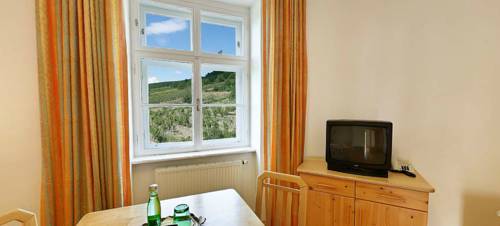 Imagen de la habitación del Hotel Schloss Gumpoldskirchen. Foto 11