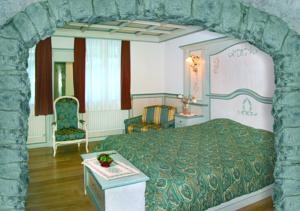 Imagen de la habitación del Hotel Schloss Hotel Dolomiti. Foto 4