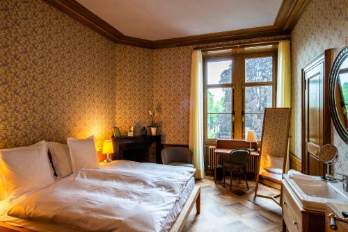 Imagen de la habitación del Hotel Schloss Schadau Swiss Historic Hotel. Foto 2