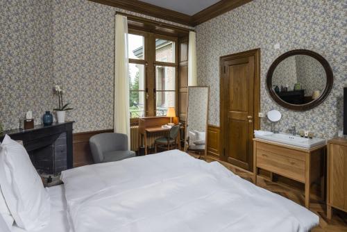 Imagen de la habitación del Hotel Schloss Schadau Swiss Historic Hotel. Foto 5