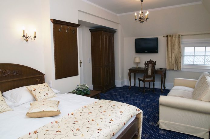 Imagen de la habitación del Hotel Schloss Wolfsbrunnen. Foto 9