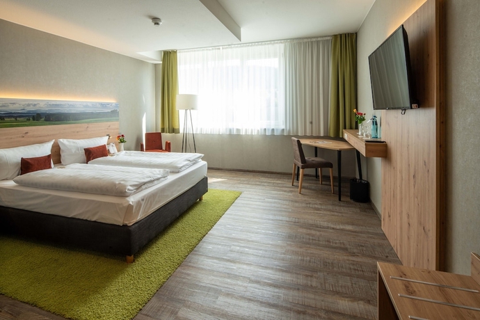 Imagen de la habitación del Hotel Schlossberg Wehingen. Foto 2