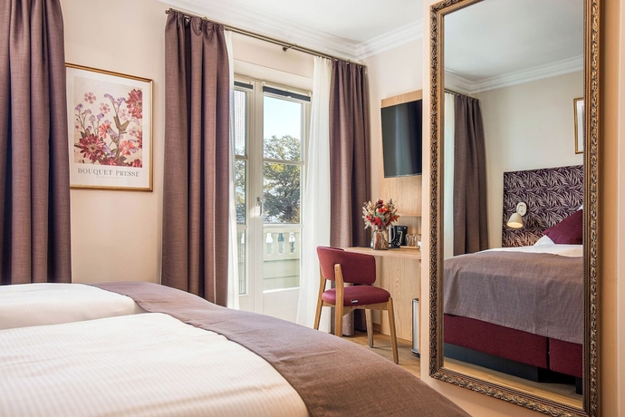 Imagen de la habitación del Hotel Schlossblick Chiemsee. Foto 9