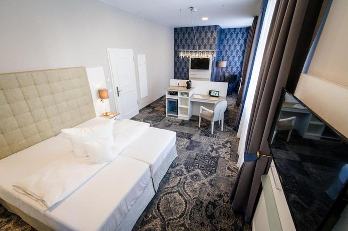 Imagen de la habitación del Hotel Schlosshotel Bad Neustadt. Foto 15