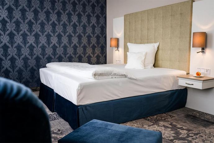 Imagen de la habitación del Hotel Schlosshotel Bad Neustadt. Foto 17