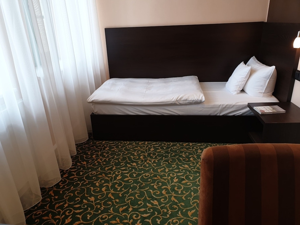 Imagen de la habitación del Hotel Schlosshotel Blankenburg. Foto 7