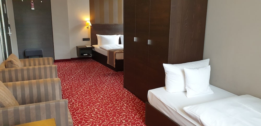 Imagen de la habitación del Hotel Schlosshotel Blankenburg. Foto 13