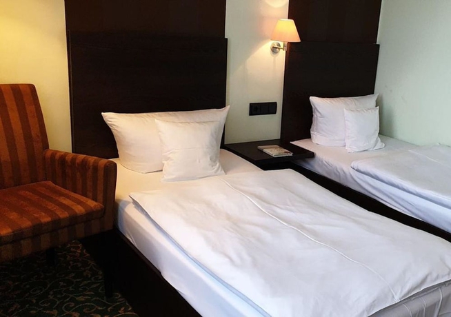 Imagen de la habitación del Hotel Schlosshotel Blankenburg. Foto 15