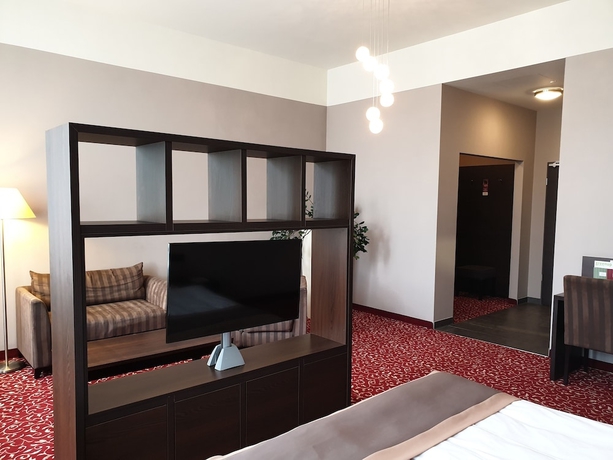 Imagen de la habitación del Hotel Schlosshotel Blankenburg. Foto 17