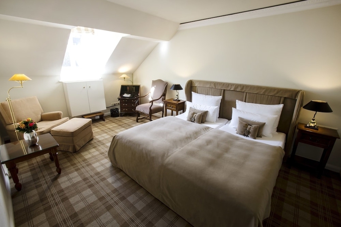 Imagen de la habitación del Hotel Schlosshotel Hugenpoet. Foto 9