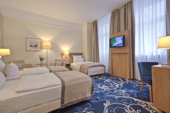 Imagen de la habitación del Hotel Schlosshotel Karlsruhe. Foto 7