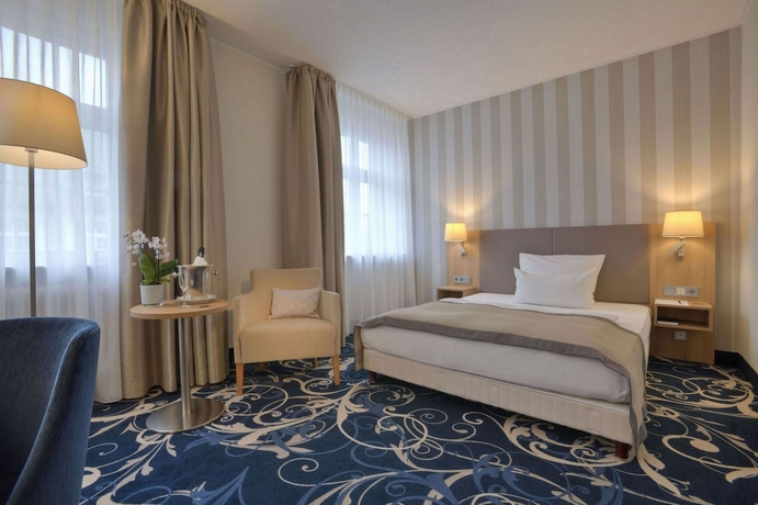 Imagen de la habitación del Hotel Schlosshotel Karlsruhe. Foto 9