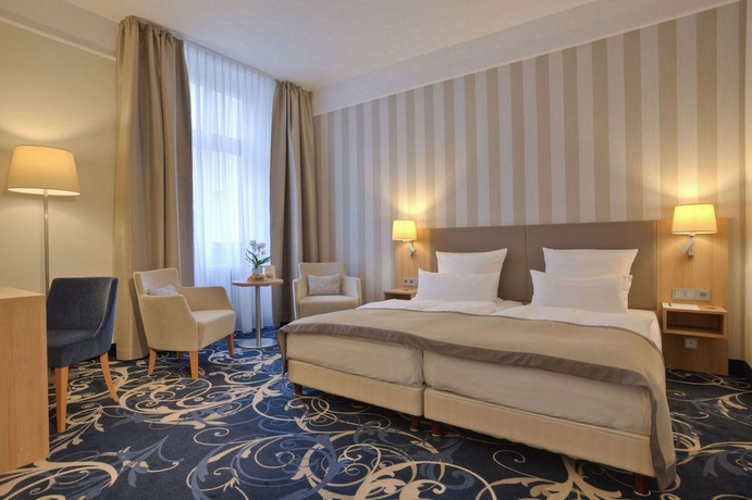 Imagen de la habitación del Hotel Schlosshotel Karlsruhe. Foto 16