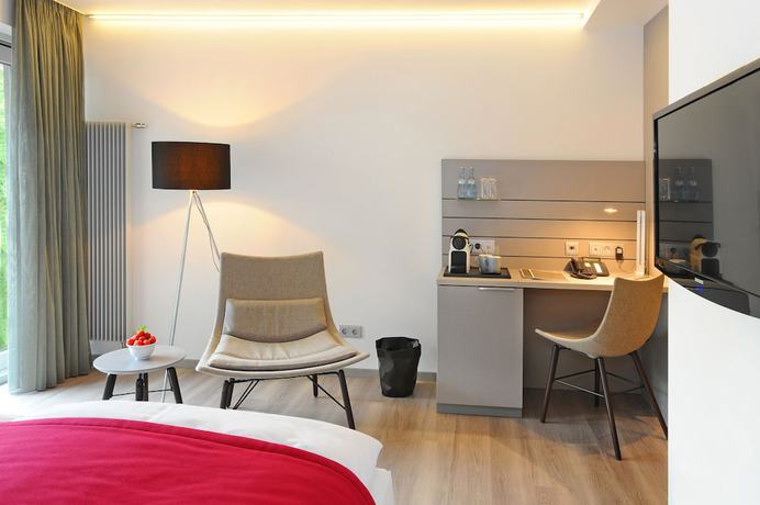Imagen de la habitación del Hotel Schlosshotel Monrepos. Foto 13
