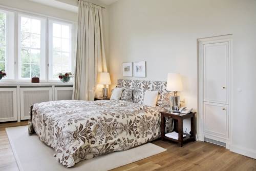 Imagen de la habitación del Hotel Schlosshotel Münchhausen. Foto 3