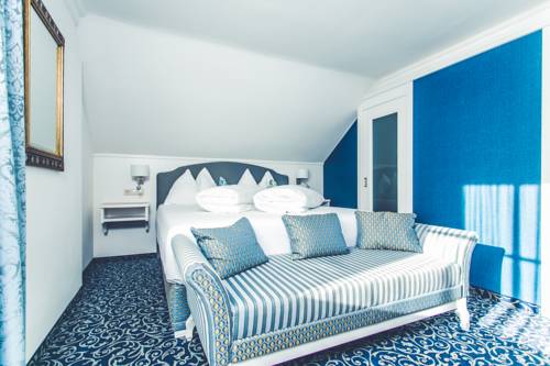 Imagen de la habitación del Hotel Schlosshotel Seewirt. Foto 7